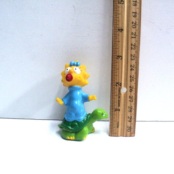 Maggie Simpson Standing on a Turtle Figurine Plastic 3" High 1990 Excellent - Picture 1 of 4